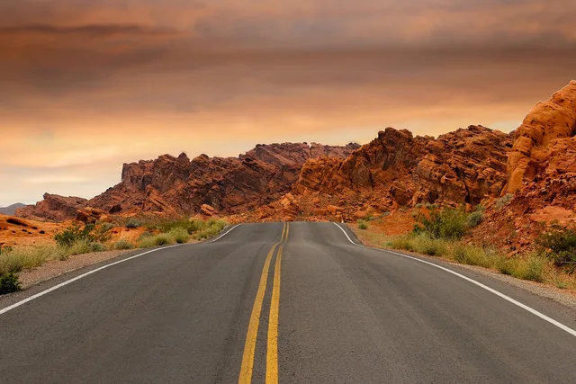 road, sandstone, sunset, pavement, dusk, red rocks, rock formations, rocks, desert, landscape, arid, outdoors, scenic, utah, nature, nevada, usa. 3 Moab and Santa Fe byways where red rock signs mark the route