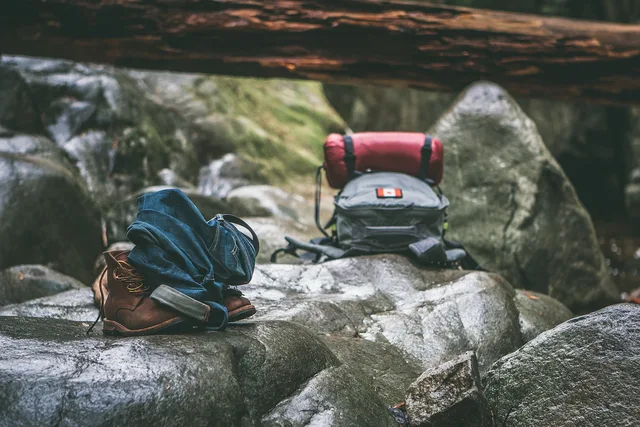 backpack, boots, rocks, backpacking, hiking, mountaineering, environment, recreation, rock, stones, travel, nature, woods, outdoors, hike, trek. No water, no shade: packing correctly for unusual roadside stops